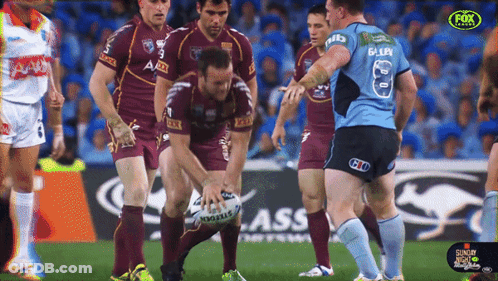 A Group Of Rugby Players On A Field With One Wearing The Number 8 Jersey GIF