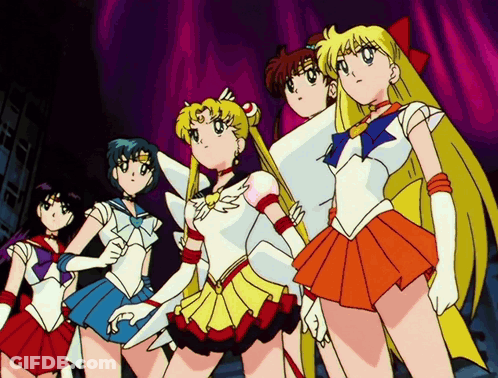 A Group Of Sailor Moon Characters Are Standing Together GIF
