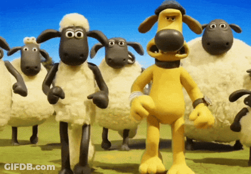 A Group Of Sheep Are Standing In A Field And One Of Them Has A Watch On His Wrist GIF