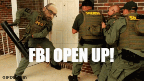 A Group Of Sheriff 'S Officers Are Standing In Front Of A Door With The Fbi Open Up Written On The Bottom GIF