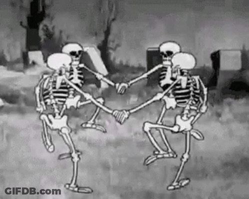 A Group Of Skeletons Are Dancing In A Circle In A Cemetery In A Black And White Cartoon . GIF