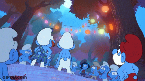 A Group Of Smurfs Are Gathered In A Forest GIF