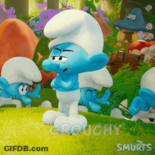 A Group Of Smurfs Are Standing In A Grassy Area With The Words Grouchy Smurfs Written On The Bottom GIF