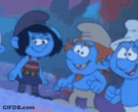 A Group Of Smurfs Are Standing Next To Each Other In A Cartoon . GIF