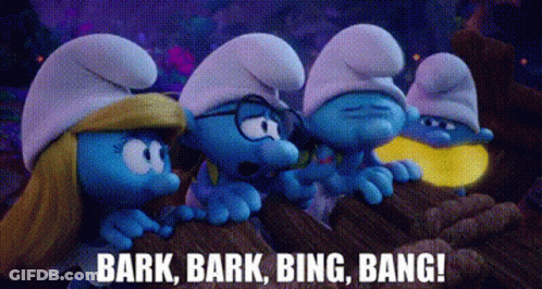 A Group Of Smurfs Are Standing Next To Each Other On A Rock And Talking . GIF