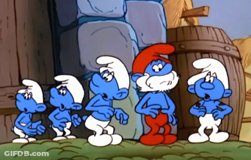 A Group Of Smurfs Standing Next To Each Other In Front Of A Building GIF