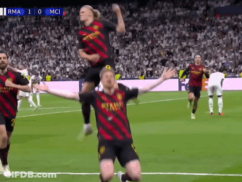 A Group Of Soccer Players Are Celebrating A Goal With A Score Of 10 To 0 GIF
