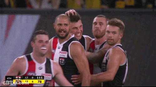 A Group Of Soccer Players Are Celebrating A Goal With Pepper Money Written On Their Jerseys GIF