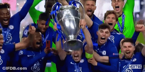 A Group Of Soccer Players Are Holding A Trophy In Their Hands GIF