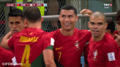 A Group Of Soccer Players Are Huddled Together And One Of Them Has The Number 7 On His Jersey GIF