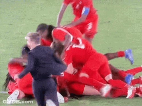 Soccer Players Huddled With Number 3 Jersey GIF