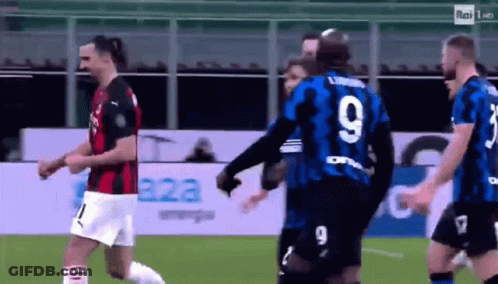 A Group Of Soccer Players Are On A Field And One Of Them Has The Number 9 On His Jersey GIF