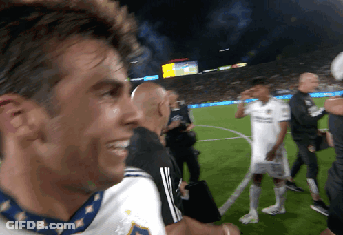 A Group Of Soccer Players Are On A Field And One Of Them Is Wearing A Jersey That Says Adidas GIF