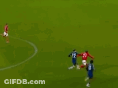 A Group Of Soccer Players Are Playing A Game Of Soccer On A Field . GIF