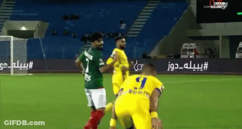 A Group Of Soccer Players Are Playing A Game On A Field . One Of The Players Has The Number 91 On His Jersey . GIF