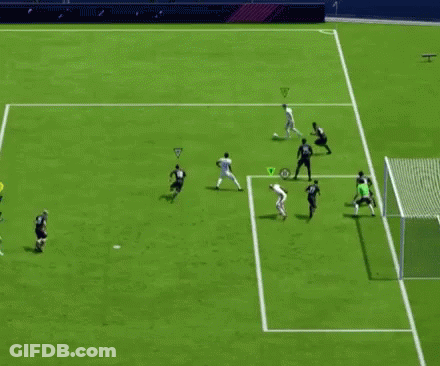 A Group Of Soccer Players Are Playing A Game On A Field With A Sign That Says Fifa On It GIF