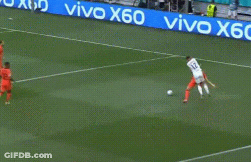 A Group Of Soccer Players Are Playing A Game On A Field With A Vivo X60 Banner In The Background . GIF