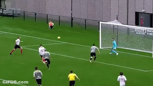 A Group Of Soccer Players Are Playing On A Field And One Of Them Has The Number 32 On His Jersey GIF