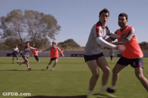 A Group Of Soccer Players Are Playing On A Field And One Of Them Is Wearing A Shirt That Says Adidas On It GIF