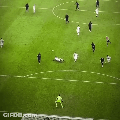 A Group Of Soccer Players Are Playing On A Field And One Of Them Is Wearing A White Jersey With The Number 10 GIF