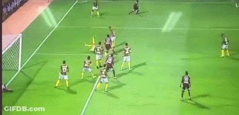 A Group Of Soccer Players Are Playing On A Field With A Banner Behind Them That Says ' Live ' GIF