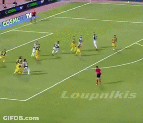 A Group Of Soccer Players Are Playing On A Field With A Cosmo Tv Advertisement In The Background GIF