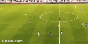 A Group Of Soccer Players Are Playing Soccer On A Field . GIF