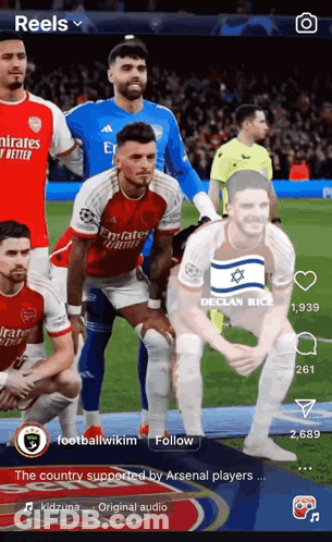 A Group Of Soccer Players Are Posing For A Picture On A Screen GIF