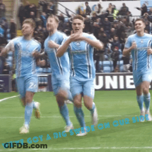 A Group Of Soccer Players Are Running On A Field With The Words We 'Ve Got A Big Swede On Our Side GIF