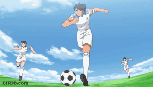 A Group Of Soccer Players Are Running Towards The Ball GIF