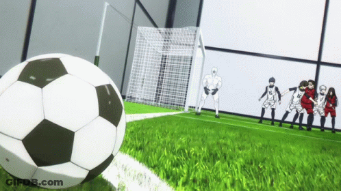 A Group Of Soccer Players Are Standing Around A Soccer Ball On The Field GIF