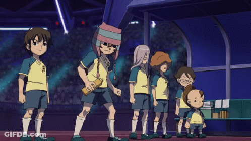 A Group Of Soccer Players Are Standing In A Line With One Wearing A Shirt That Says ' Samurai ' GIF