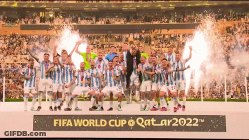 A Group Of Soccer Players Are Standing In Front Of A Sign That Says Fifa World Cup Qatar2022 GIF