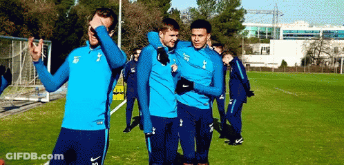A Group Of Soccer Players Are Standing On A Field And One Of Them Has The Number 16 On His Jersey GIF