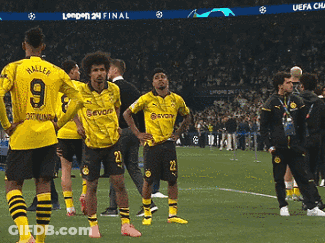 A Group Of Soccer Players Are Standing On A Field And One Of Them Has The Number 9 On His Shirt GIF