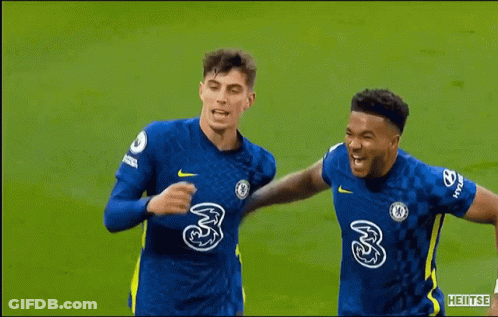 A Group Of Soccer Players Are Standing On A Field And One Of Them Is Wearing A Number 24 Jersey . GIF