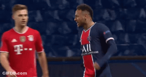 A Group Of Soccer Players Are Standing On A Field . GIF