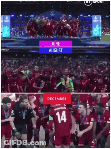 A Group Of Soccer Players Are Standing On A Stage And One Has The Number 14 On His Jersey GIF