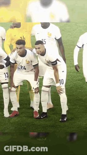 A Group Of Soccer Players Are Standing On The Field And One Has The Number 10 On His Jersey GIF