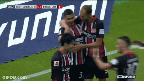 A Group Of Soccer Players Celebrate A Goal Against Frankfurt GIF