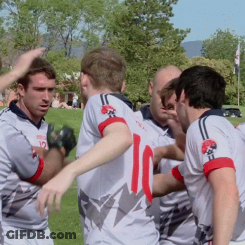 A Group Of Soccer Players Huddle Together With One Wearing The Number 10 GIF