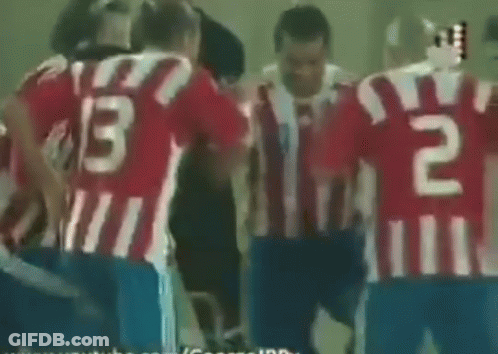 A Group Of Soccer Players Huddled Together With The Number 13 On Their Backs GIF