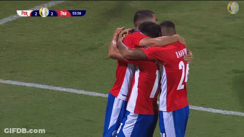 A Group Of Soccer Players Hugging Each Other With The Score Per 2 Par 53:40 In The Background GIF