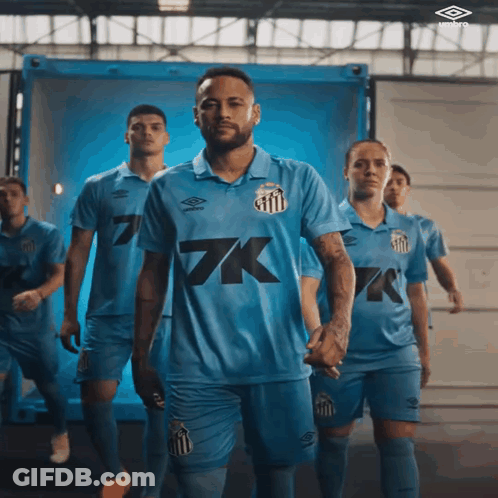 A Group Of Soccer Players In Blue Uniforms With 7K On The Front GIF