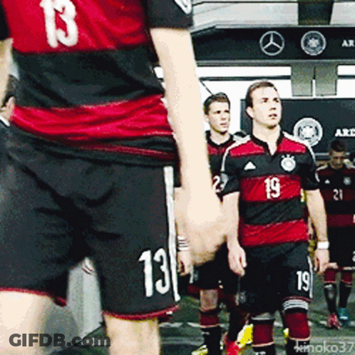 A Group Of Soccer Players Including Number 13 And 19 GIF