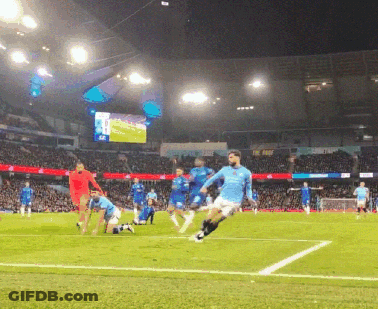 A Group Of Soccer Players On A Field With A Large Screen In The Background That Says ' Allianz ' On It GIF
