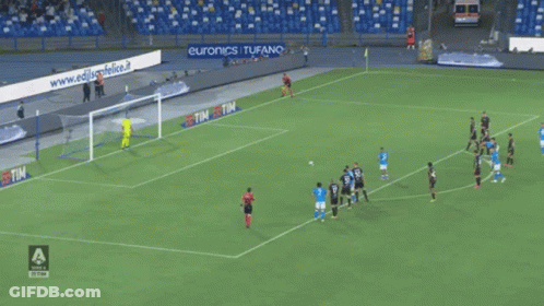 A Group Of Soccer Players On A Field With An Ad For Euronics I Tufano Behind Them GIF