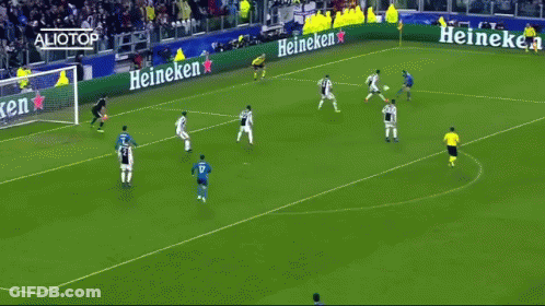 A Group Of Soccer Players On A Field With Heineken Ads GIF