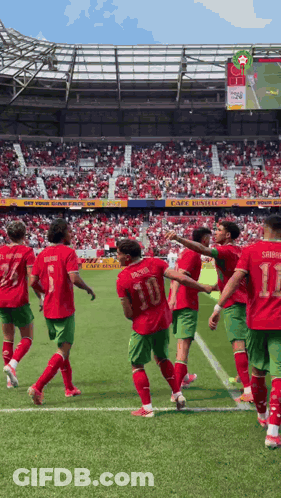 A Group Of Soccer Players On A Field With One Wearing Number 10 GIF