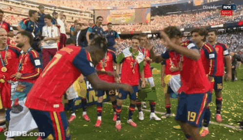 A Group Of Soccer Players On A Field With One Wearing The Number 7 GIF